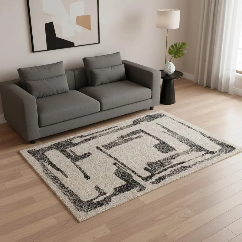 5 X 8 Beige And Black Abstract Area Rug